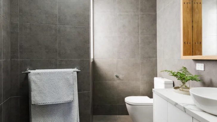 Experience the Serenity of Nature Transform Your Bathroom with Elegant Stone Effect Grey Tiles. 