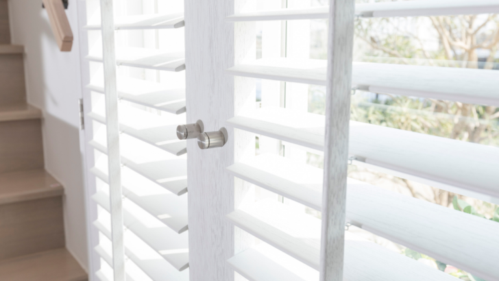 Make a Bold Statement with White Wooden Blinds and Black Tapes Elevate Your Windows with Modern Contrast and Classic Style.